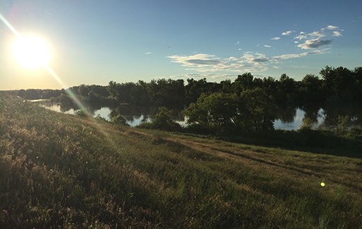 The sunrises over the Missouri River in Great Falls, Montana.